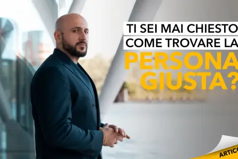 Uomo con barba in giacca blu riflette su come capire se è la persona giusta.