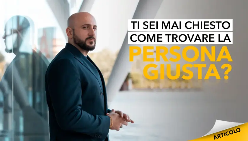 Uomo con barba in giacca blu riflette su come capire se è la persona giusta.